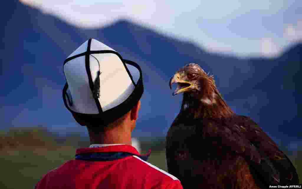 A young eagle hunter at the games. In the first Nomad Games, in 2014, a chained wolf was used as bait for the eagle-hunting event. This time, dead birds swung on a string were used to lure the eagles.&nbsp;