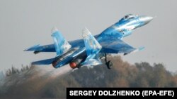 A Ukrainian Su-27 fighter jet flies during the Clear Sky 2018 multinational military drills in the Khmelnytskiy region last week.