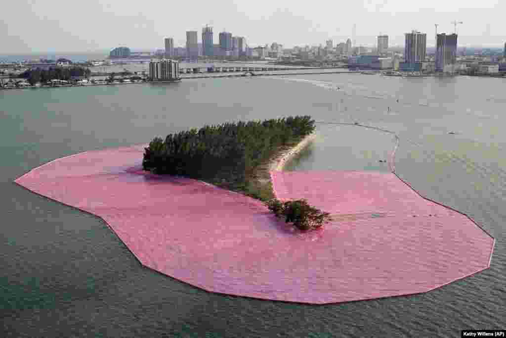 This 1983 photo shows Christo&#39;s environmentally themed piece titled Surrounded Islands in the process of being installed in Miami, Florida.&nbsp;