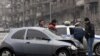 Armenia -- Traffic police investigate a car collision in Yerevan, 11Jan2011.