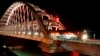 UKRAINE - Russian passenger train on the Kerch bridge, 25Dec2019