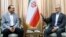 Iranian President Masud Pezeshkian (right) meets with Pakistani army chief, Field Marshal Asim Munir, in Tehran on May 23.