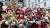 UKRAINE – Ukrainians sing Christmas carols as they carry decorated star of Bethlehem and sheaves of wheat during a Christmas parade in downtown Lviv, 2018