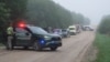 Military police and response vehicles stand parked near the site where, according to the Lithuanian National Crisis Management Center, am Italian NATO fighter jet shot down a drone in Lithuania, September 15, 2026.