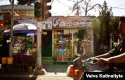 Abdul Hamid at his food store in central Mazar-e Sharif