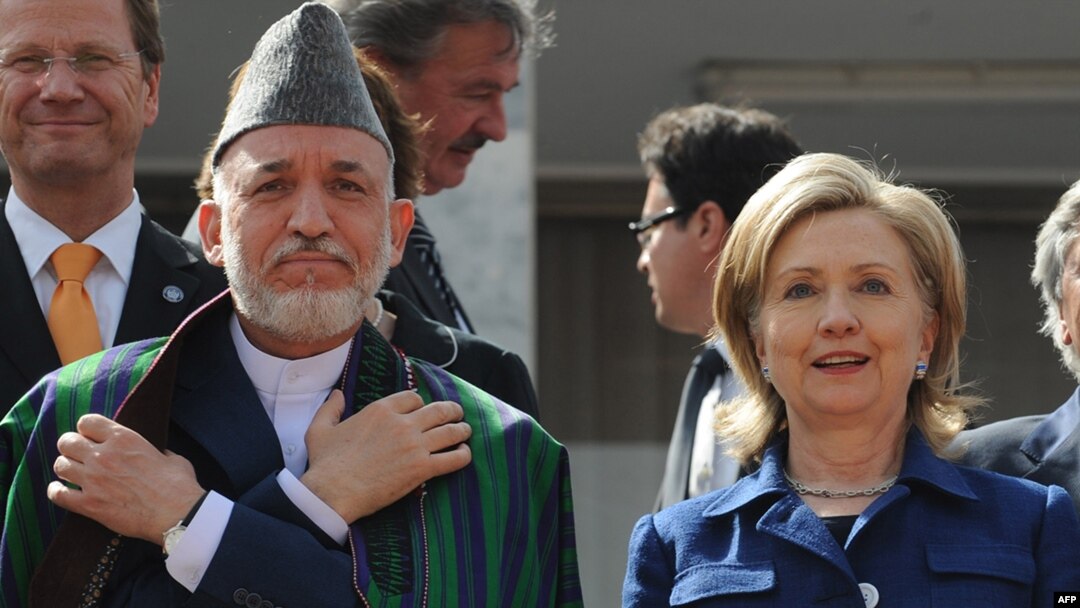 Afghan President Hamid Karzai (left) and U.S. Secretary of State Hillary Clinton (file photo)