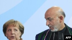 ولسمشر حامد کرزی او د جرمني صدراعظمه انګیلا میرکل