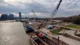 Construction is under way at the site of a new bridge on the Sava River in Belgrade. 