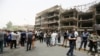 Iraqis mourned as the death toll from a bombing at Baghdad's Karrada shopping mall claimed by the Islamic State rose to at least 213.