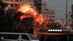 A fireball rises from the site of an Israeli air strike that targeted a building in Beirut’s Bashoura neighborhood on March 18.
