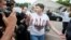 Nadia Savchenko talks to the media at Boryspil International airport outside Kyiv on May 25 after being released from imprisonment in Russia.