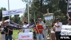 Demonstrators In Bishkek protest against OSCE police deployment In southern Kyrgyzstan on July 26.