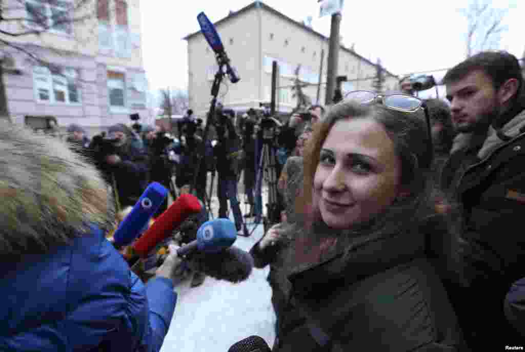 Maria Alyokhina, a member of Russian punk band Pussy Riot, speaks to the media after her release from a penal colony in Nizhny Novgorod on December 23. (Reuters/Sergei Karpukhin)