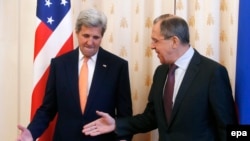 Russian Foreign Minister Sergei Lavrov (right) welcomes U.S. Secretary of State John Kerry prior to their talks in Moscow on March 24.