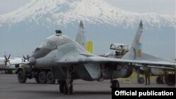 Armenia - A Russian MiG-29 fighter jet is seen at Erebuni airport in Yerevan against the backdrop of Mount Ararat.