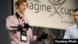 A member of Ukraine's quadSquad demonstrates Enable Talk, which won first place in the software design category at Microsoft's Imagine Cup.