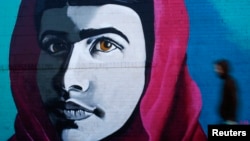 Граффити с изображением Малалы Юсафзай в Нью-Йорке