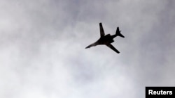 Коалиция самолётларидан бирининг Кобани узра парвози, 2014 йил 16 октябри.