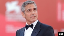 Italy -- US actor and director George Clooney arrives for the premiere of his movie 'The Ides of March' that opened the 68th Venice Film Festival, in Venice, 31Aug2011