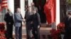 Soviet leader Mikhail Gorbachev (second from left) shakes hands with U.S. Vice President George Bush as President Ronald Reagan stands behind them before talks in New York in December 1988.