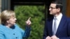 German Chancellor Angela Merkel (left) speaks with Polish Prime Minister Mateusz Morawiecki at the Palace on the Isle in Royal Lazienki Park in Warsaw on September 11.