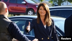 Darijana Filipovic, candidate of the Croatian Democratic Union (HDZ), meets with supporters on October 4.