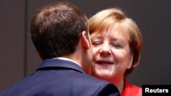 Angela Merkel și Emmanuel Macron în summit UE la Bruxelles.