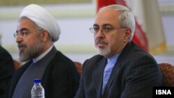 New Iranian President Hassan Rohani (left) and Iranian Foreign Minister Mohammad Javad Zarif