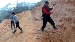 Uneasy Riders: Kyrgyz Villagers Build Own Road To Avoid Deadly Route