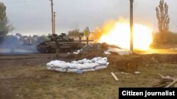 Ukrainian Soldier's Video Shows Intense Fighting Around Donetsk (video grab)