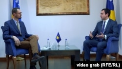 Kosovo's new prime minister Albin Kurti (right) made his remarks in an interview with RFE/RL's Balkan Service on February 7.