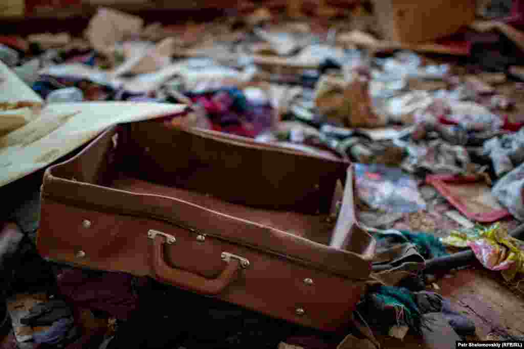 Personal belongings scattered inside an empty apartment