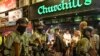 Riot police march in Wan Chai district, a touristic area where foreigners gather in bars, in Hong Kong on October 4, 2019