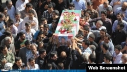 One of the photos that the Ghasam.ir website was publishing, purportedly of the coffin of IRGC member Alireza Moshajari from his funeral in Tehran on June 16.