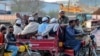FILE: Worshippers leave a Tablighi Ijtema or religious gathering in Raiwind on the outskirts of Lahore on March 13.