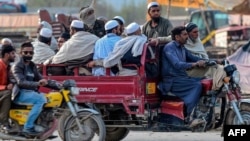 Worshippers leave the religious gathering in Lahore on March 13.