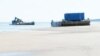 Platformele plutitoare ale proiectului 114 în Nenoksa cu containerele de deșeuri nucleare, unul afectat de explozia de la 8 august 