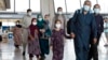 Families evacuated from Kabul arrive at Washington Dulles International Airport in 2021.