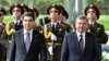 According to his press service, Uzbek President Shavkat Mirziyoev (right) spoke by telephone with his Turkmen counterpart Gurbanguly Berdymukhammedov (left) on July 24. (file photo)