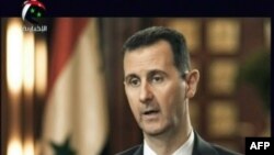 Відеокадр виступу Башара аль-Асада, 17 квітня 2013 року
