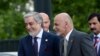 FILE: Afghan President Ashraf Ghani (R) with Chief Executive Abdullah Abdullah (L) in Poland.