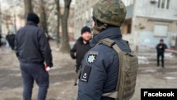 Police cordon off the site of an explosion in a neighborhood in Dnipro, Ukraine, on December 14.