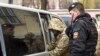 Арестованный украинский моряк под конвоем
