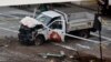 Police tape rests on a damaged Home Depot truck after a man drove onto a bike path near the World Trade Center memorial on October 31 in New York City.