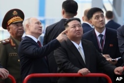Президент Росії Володимир Путін і лідер Північної Кореї Кім Чен Ин