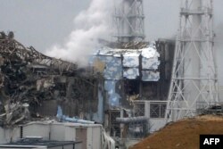 عکسی از رآکتورهای آسیب‌دیده فوکوشیما در پی زلزله و سونامی سال ۲۰۱۱