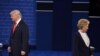 U.S. Democratic presidential candidate Hillary Clinton (right) and Republican presidential candidate Donald Trump arrive for the second presidential debate at Washington University in St. Louis on October 9.