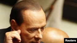 Standard & Poor's rating agency described Italian Prime Minister Silvio Berlusconi's governing coalition as "fragile."