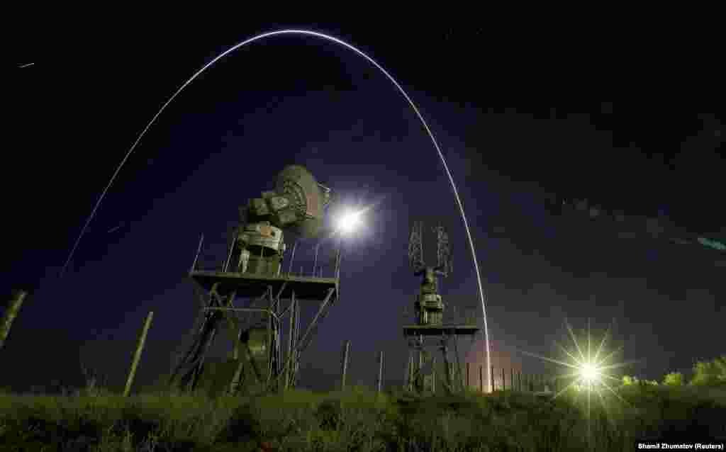 A Proton-M rocket blasts off with a Spanish communications satellite at the Baikonur Cosmodrome in Kazakhstan on September 12. (Reuters/Shamil Zhumatov)