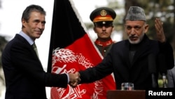 NATO Secretary-General Anders Fogh Rasmussen (left) with Afghan President Hamid Karzai during his visit to Kabul last week.
